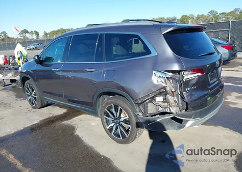 2022 Honda Pilot 2Wd Touring 7 Passenger z USA, uszkodzony, nr VIN 5FNYF5H67NB011450